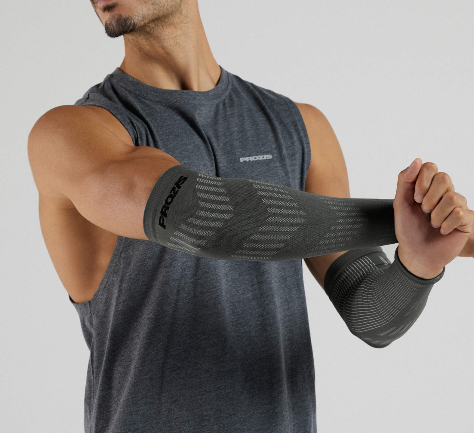 Gift the Comptech Endurance Arm Sleeve in stylish grey, perfect for active individuals seeking comfort and support.